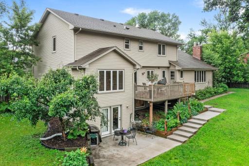 Great outdoor spaces â deck and walkout patio space overlooking the yard, creating the perfect setting for relaxing or entertaining.