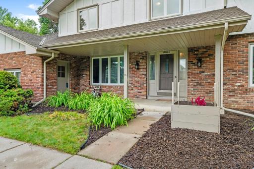 Welcome home! Large front porch and refreshed landscaping.