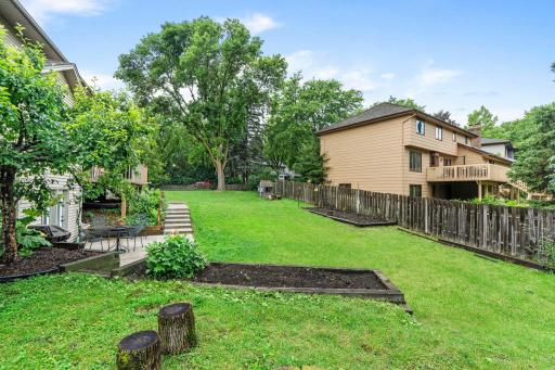 Large, fenced in backyard offers great space to run and play.
