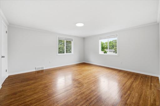 Bright and airy third bedroom on the upper level