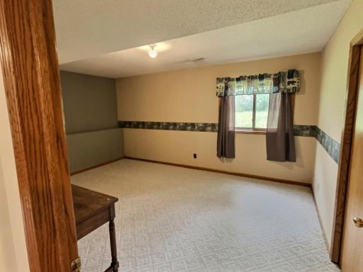 This fourth bedroom is also located on the lower level.