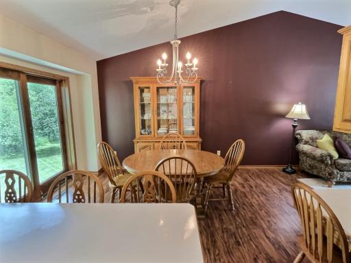 The dining room with great views overlooking the backyard where you will enjoy viewing of a variety of wildlife.