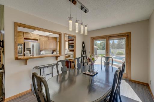 Enjoy casual meals in the informal dining area with easy walkout access to the private patio!