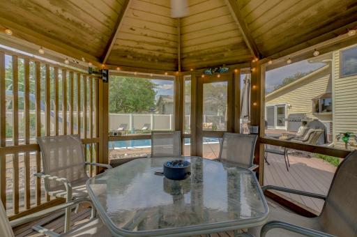 The charming gazebo creates the perfect setting for outdoor dining, relaxing, or entertaining!