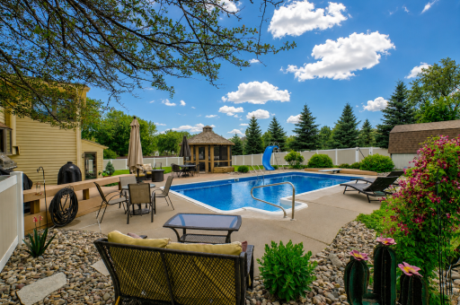 Your ultimate summer retreatâenjoy endless days in the heated pool featuring a slide and diving board!