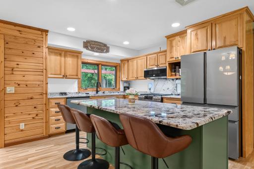 Kitchen and center island w/granite countertops, Café brand luxury Platinum Glass appliances