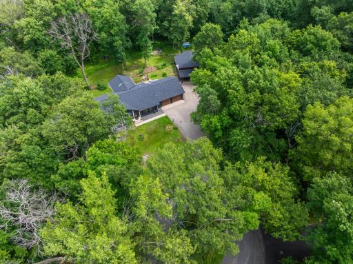Aerial of home, shop and .94 acre lot