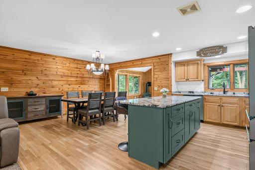 Dining room directly off kitchen and 4-season porch, hardwood floors