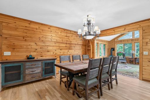 Dining room and into the 4-season porch, hardwood floors