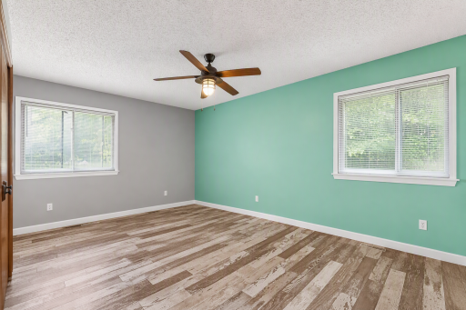 Primary bedroom, virtually enhanced