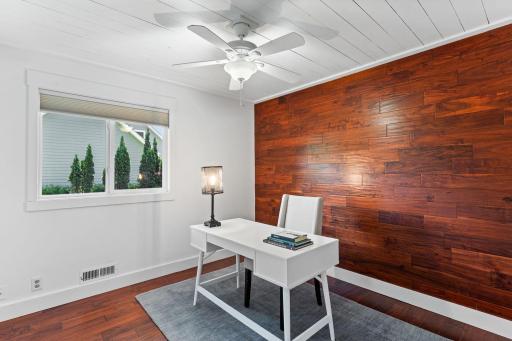 Main floor third bedroom provides an ideal option for a home office