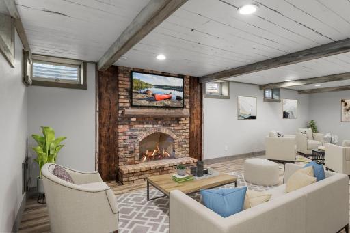 Gather around the fireplace and enjoy a cozy space for relaxing and entertaining *this photo is virtually staged