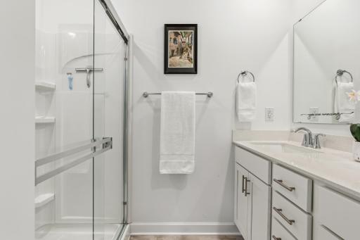 14909 Archdale Lane_A walk-in shower that feels more spa than starter home.