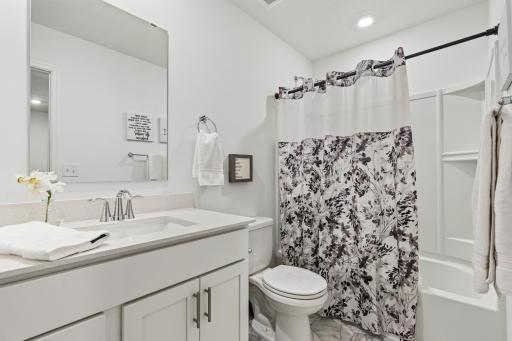 14909 Archdale Lane_A classic shower-tub combo, simple and practical.
