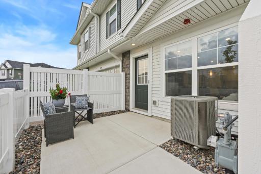 14909 Archdale Lane_Your morning coffee spot. A private, low-maintenance patio tucked behind a privacy fence â ready for relaxation, not projects.