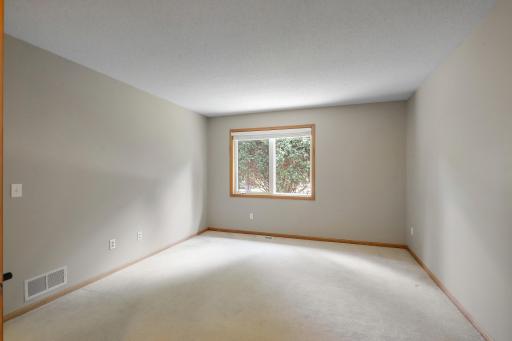 Main floor master bedroom with east face window for morning sunlight!