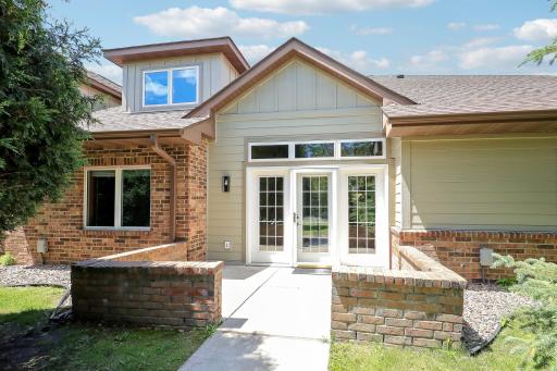 Brick enclosed patio area with east face to Stinson Parkway.