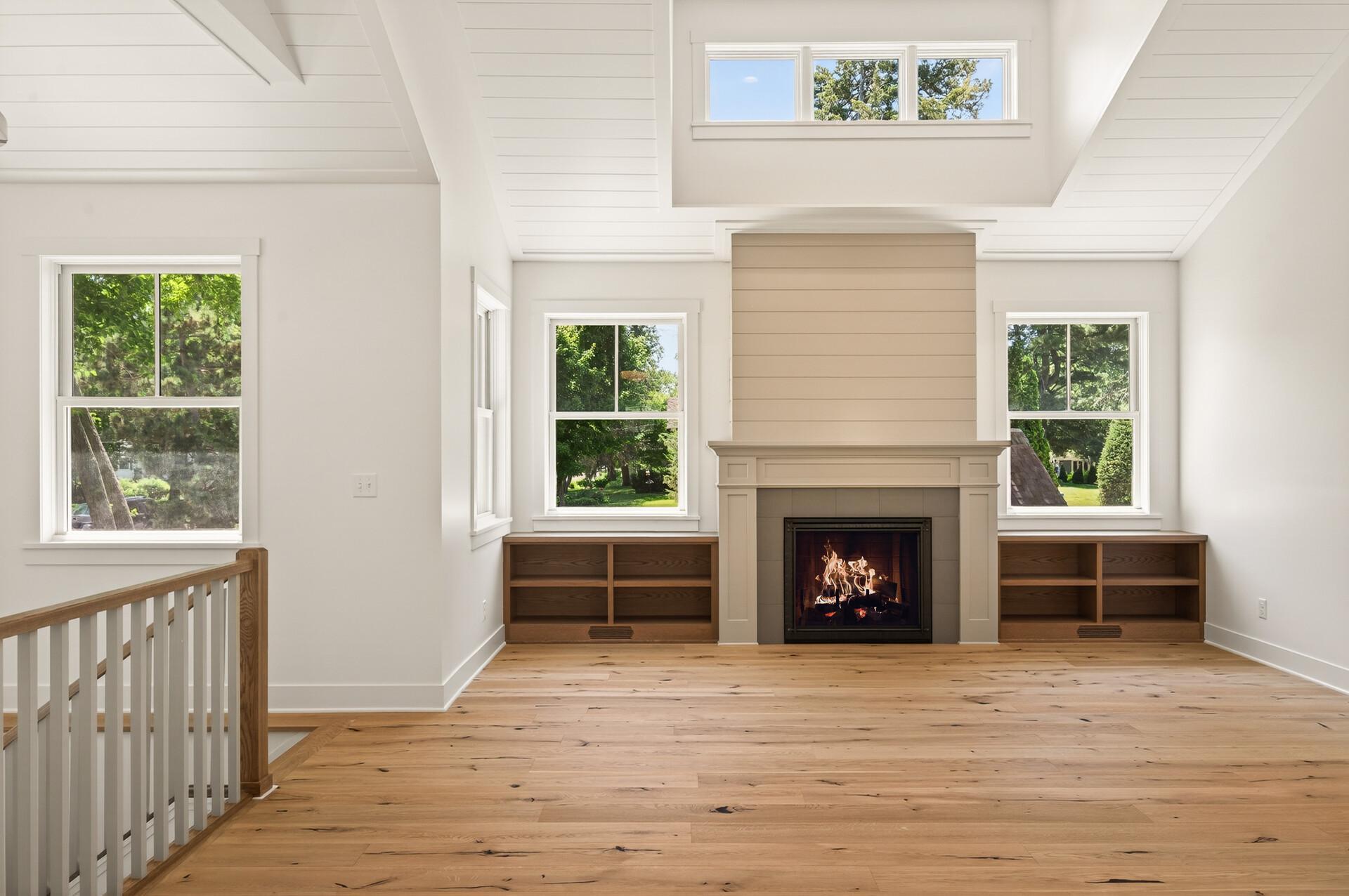 Vaulted living room with ship lap custom ceilings