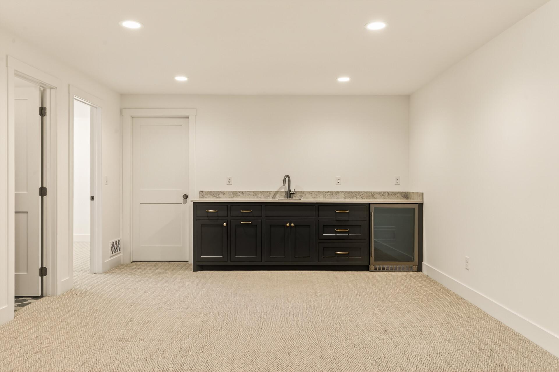 Lower level bar, sink, Bev fridge