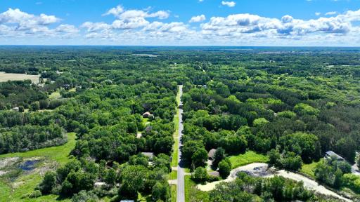 Paved Road leading to the property well set off of Broadway, low traffic street as it wraps around the neighborhood before turning into 177th Ln NE