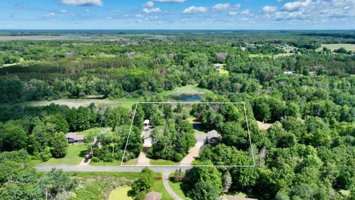 Private home offers a wildlife buffer on all sides creating a peaceful home setting. Lot lines are approximate estimates.