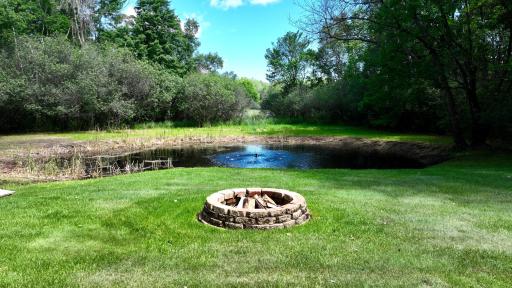 Great Firepit to Enjoy those cozy campfires right in the middle of the backyard, listen to the fire, the fountain and look at the stars all from one spot.