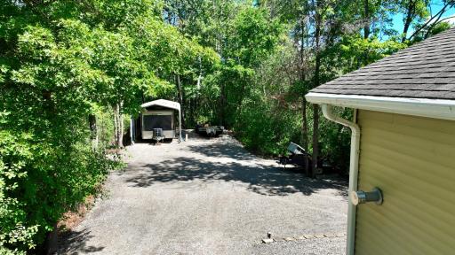 Lots of Extra Parking and Turnaround Space Behind the Outbuilding.