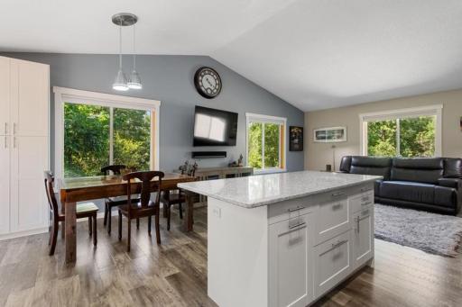 Large Kitchen Island offers space for seating, as well as power in the island for all your crockpots when hosting guests