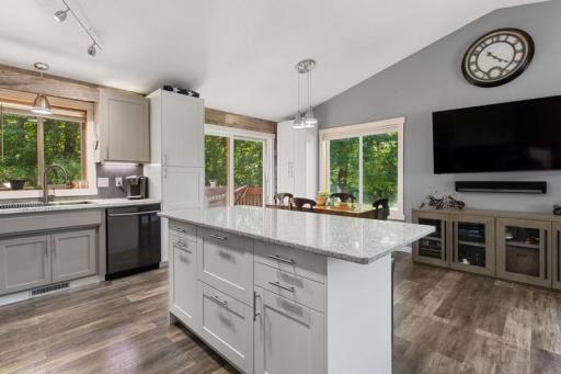 Solid Surface countertop on center island really pops in this kitchen