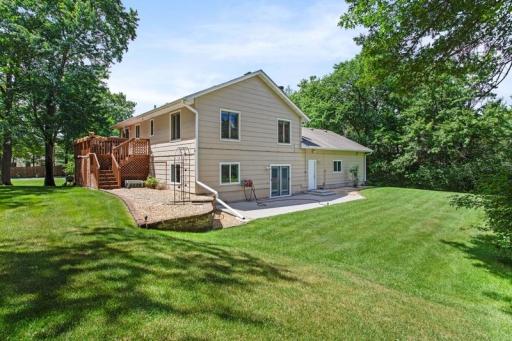 Walkout basement with a 30' x 12' Concrete Patio, walk right into the backyard, or right up the landscaping to your deck!