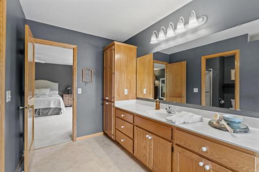 Spacious Primary Suite w/ private Bath, separate tub/shower & oversized walk-in closet.
