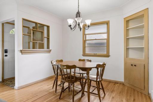 Dining area with corner hutch and foyer opening...CLASSIC!
