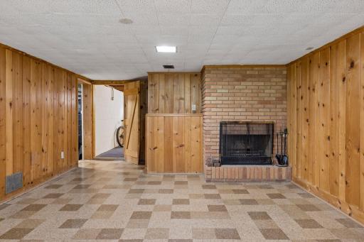 Knotty pine lower level with huge storage and space for another bedroom