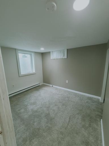 So much natural light in lower level bedroom
