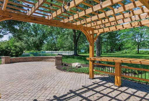 freshly stained pergola with electricity