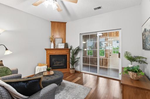 The three-season porch and patio bring connection to the peaceful backyard