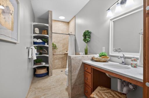 Completely renovated primary en-suite bathroom with roll-in shower