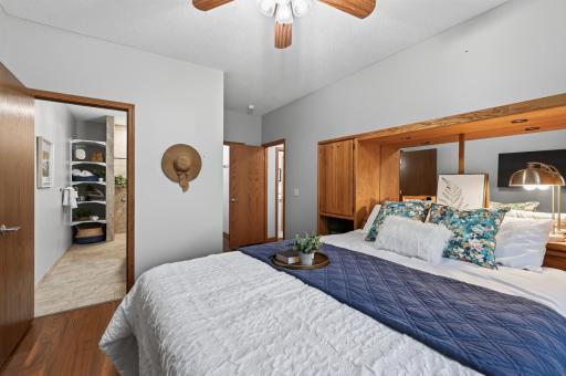 The primary bedroom with en-suite and walk-in closet