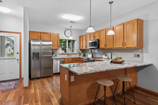 Sunny spacious kitchen with new granite countertops