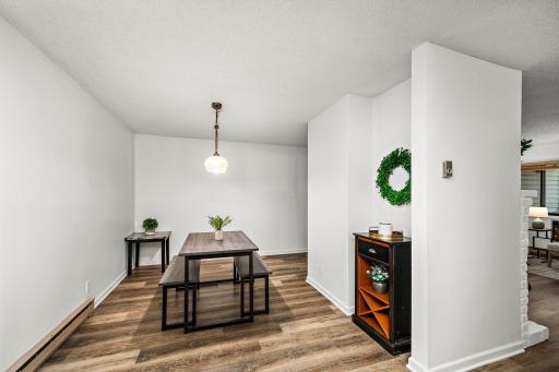 A quaint nook in the dining area is perfect for a coffee bar, small buffet, or your favorite accent piece.