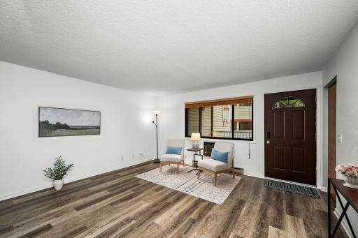 A welcoming, freshly painted living space that is filled with natural light.