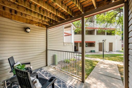 Enjoy your morning coffee or unwind at the end of the day on your private covered patio.