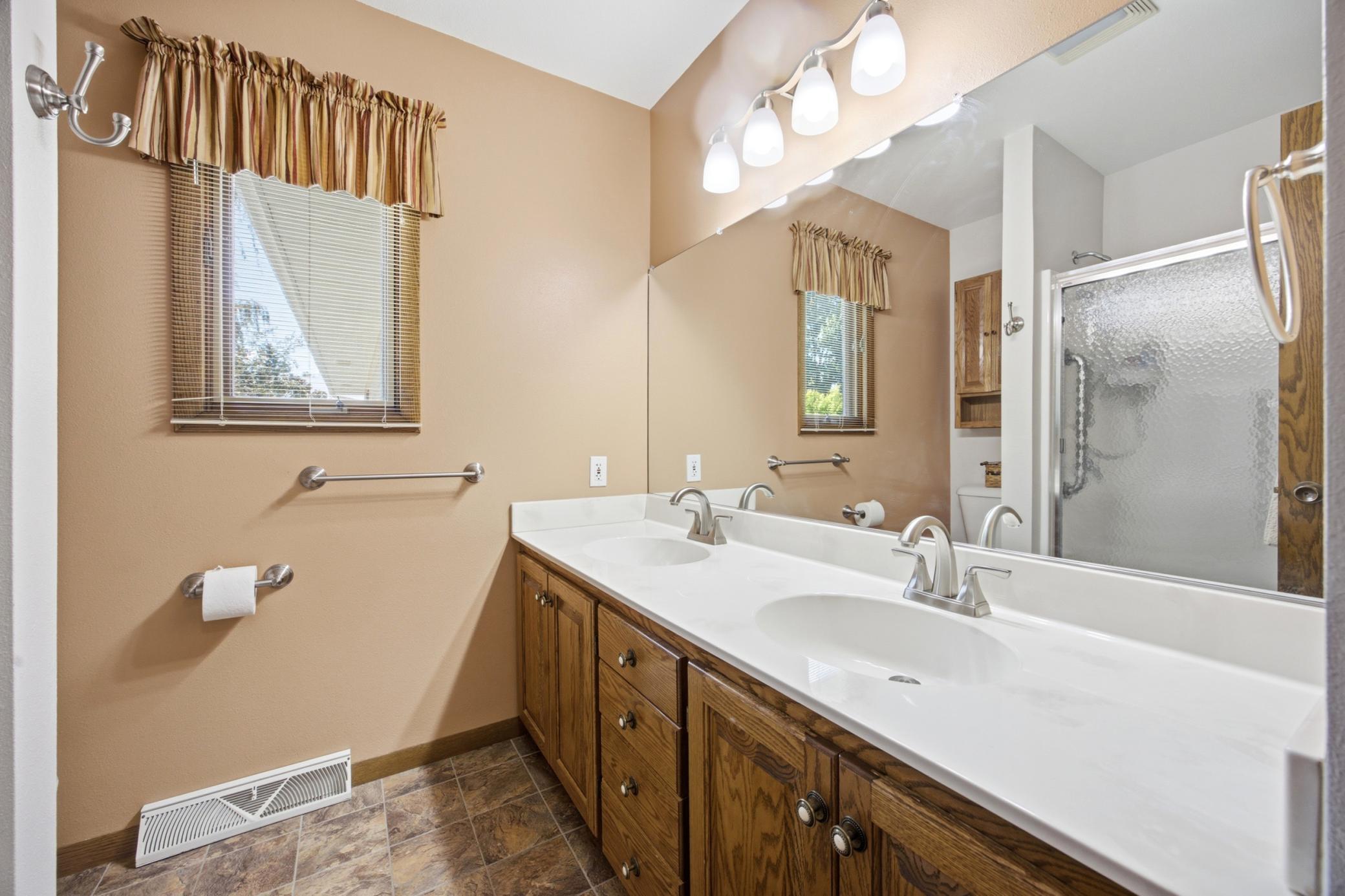 Main level bathroom with double sinks