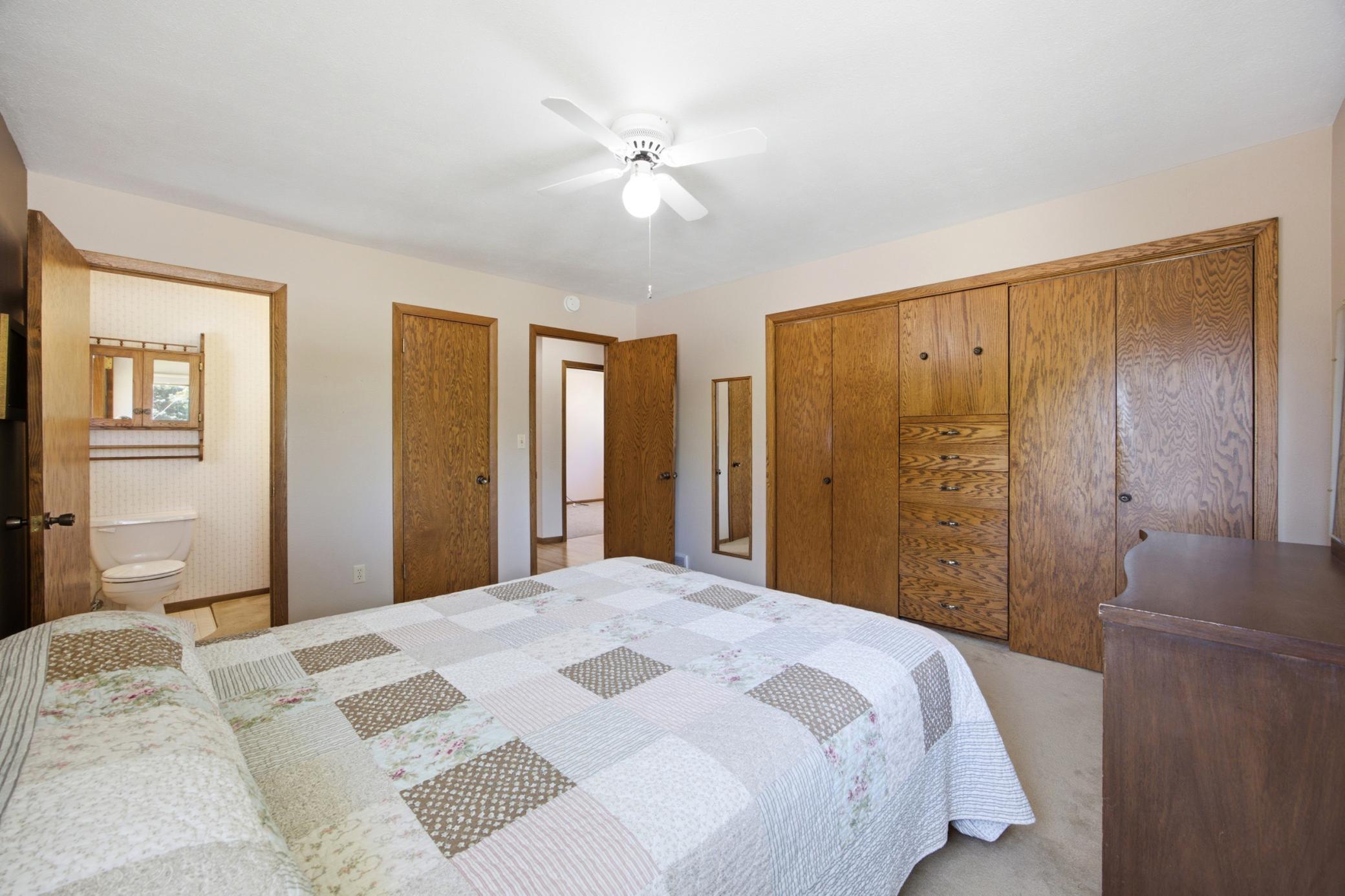 Primary bedroom w/double closets and ensuite bathroom