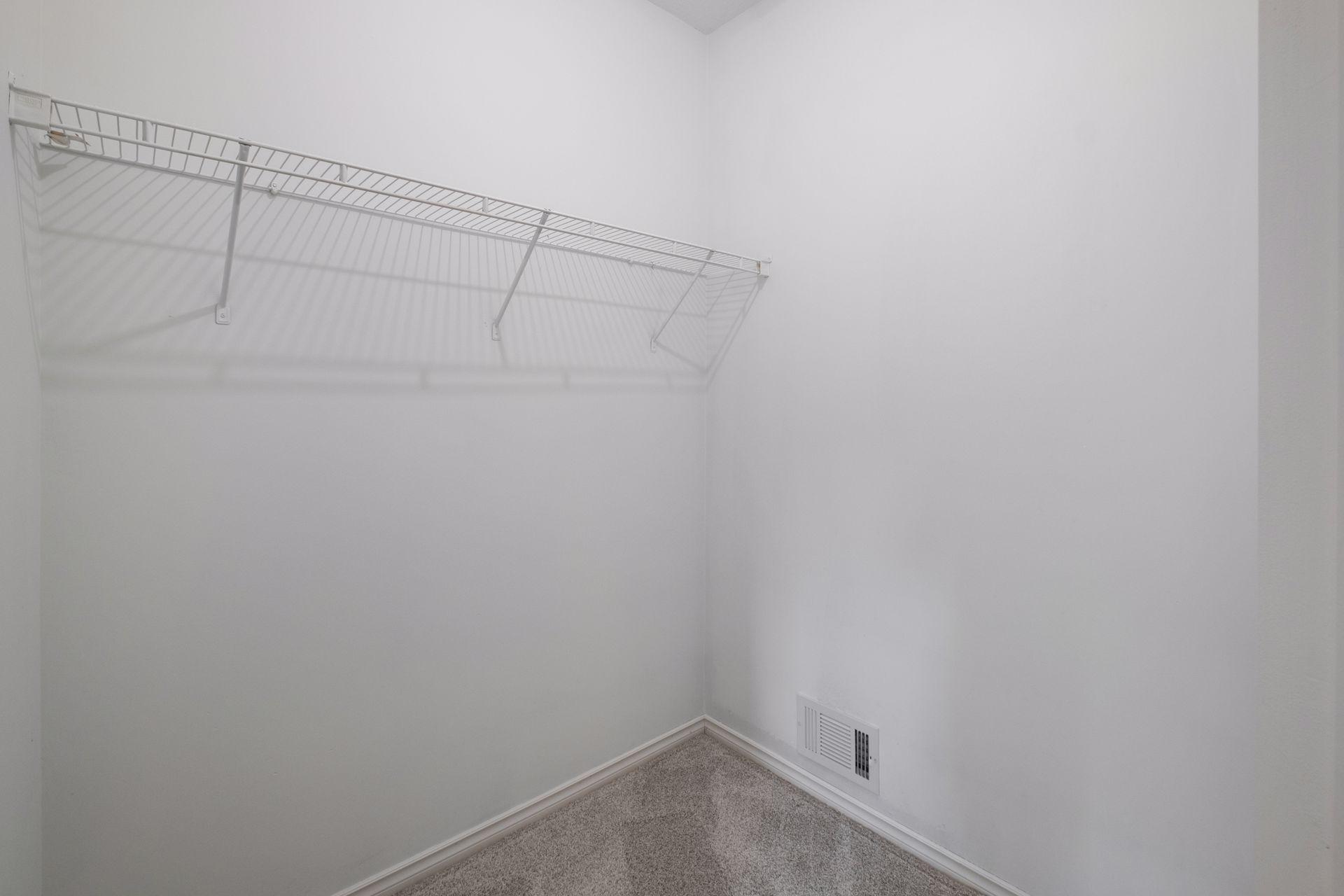 Primary Bedroom Walk- In Closet