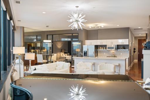 A seamless flow between living, dining, and kitchen areas.