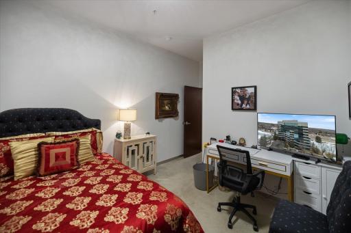 A cozy guest space with its own stylish 3/4 bath, giving visitors comfort and privacy.