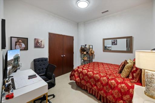 A cozy guest space with its own stylish 3/4 bath, giving visitors comfort and privacy.
