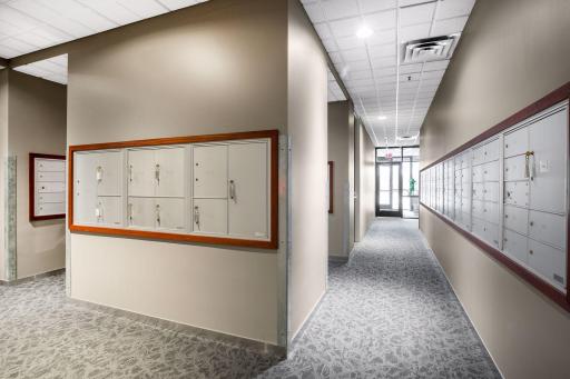 Stylish mailroom that blends seamlessly with the modern building design.