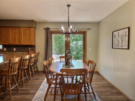 Dining area off the kitchen. Patio door leads to your brand new deck.